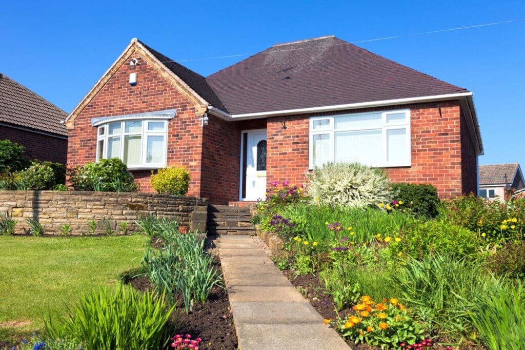 an overview of house with garden